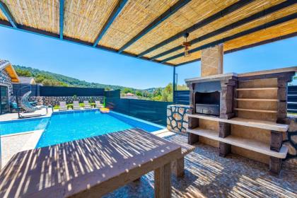 Kalkan'da 2 Yatak Odalı Jakuzili Villa-Villa Seabird - image 12