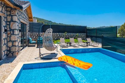 Kalkan'da 2 Yatak Odalı Jakuzili Villa-Villa Seabird - image 8