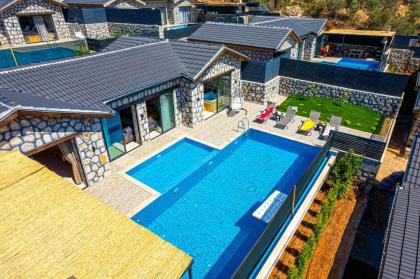 Kalkan'da 2 Yatak Odalı Jakuzili Villa-Villa Seabird - image 9