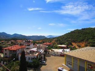 Yiğit apart with a terrace in sea and mountains - main image