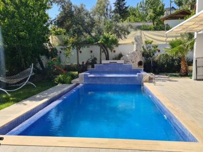 Villa with Jacuzzi and Backyard in Kalkan - image 11